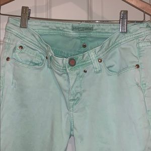 Green bell bottom jeans